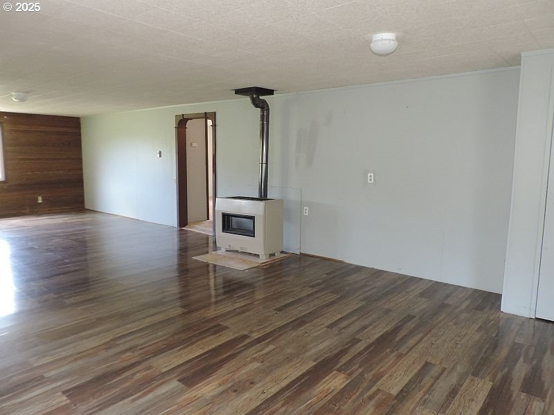 1525 Highway 97 Goldendale, WA 98620 - Photo 12 of 46 a view of empty room with wooden floor