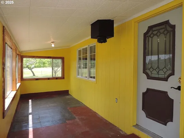 a view of a room with windows