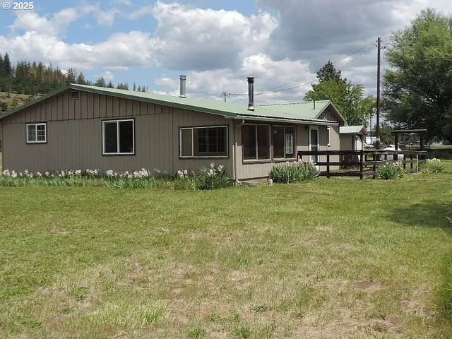 a house view with garden space