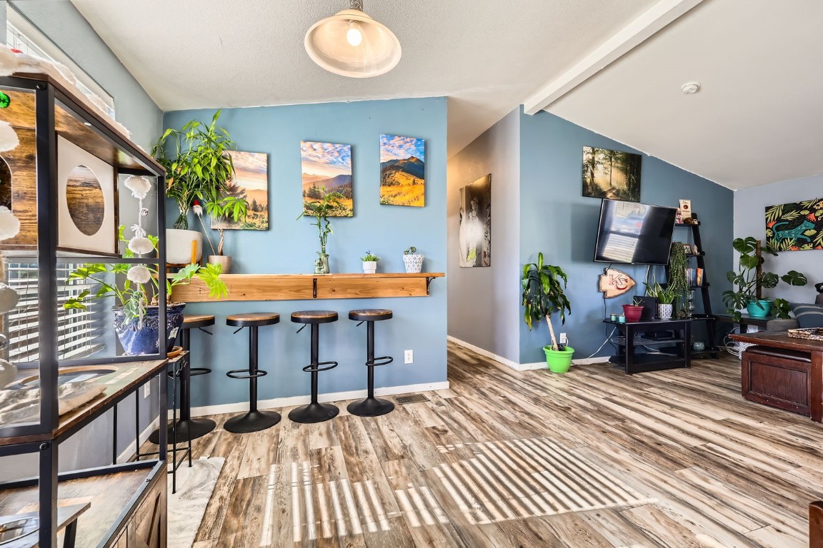 105 Red Cloud Peak Drive Dillon, CO 80435 - Photo 11 of 28 a bedroom with furniture and a wooden floor