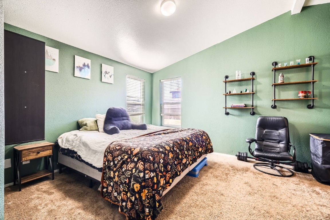 105 Red Cloud Peak Drive Dillon, CO 80435 - Photo 13 of 28 a bedroom with a bed wooden floor and window