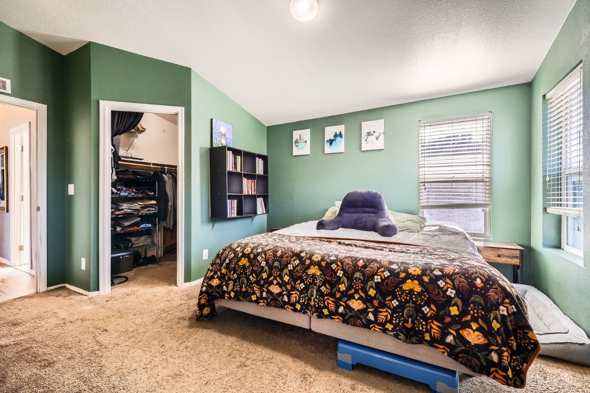 105 Red Cloud Peak Drive Dillon, CO 80435 - Photo 14 of 28 a bedroom with a bed and window