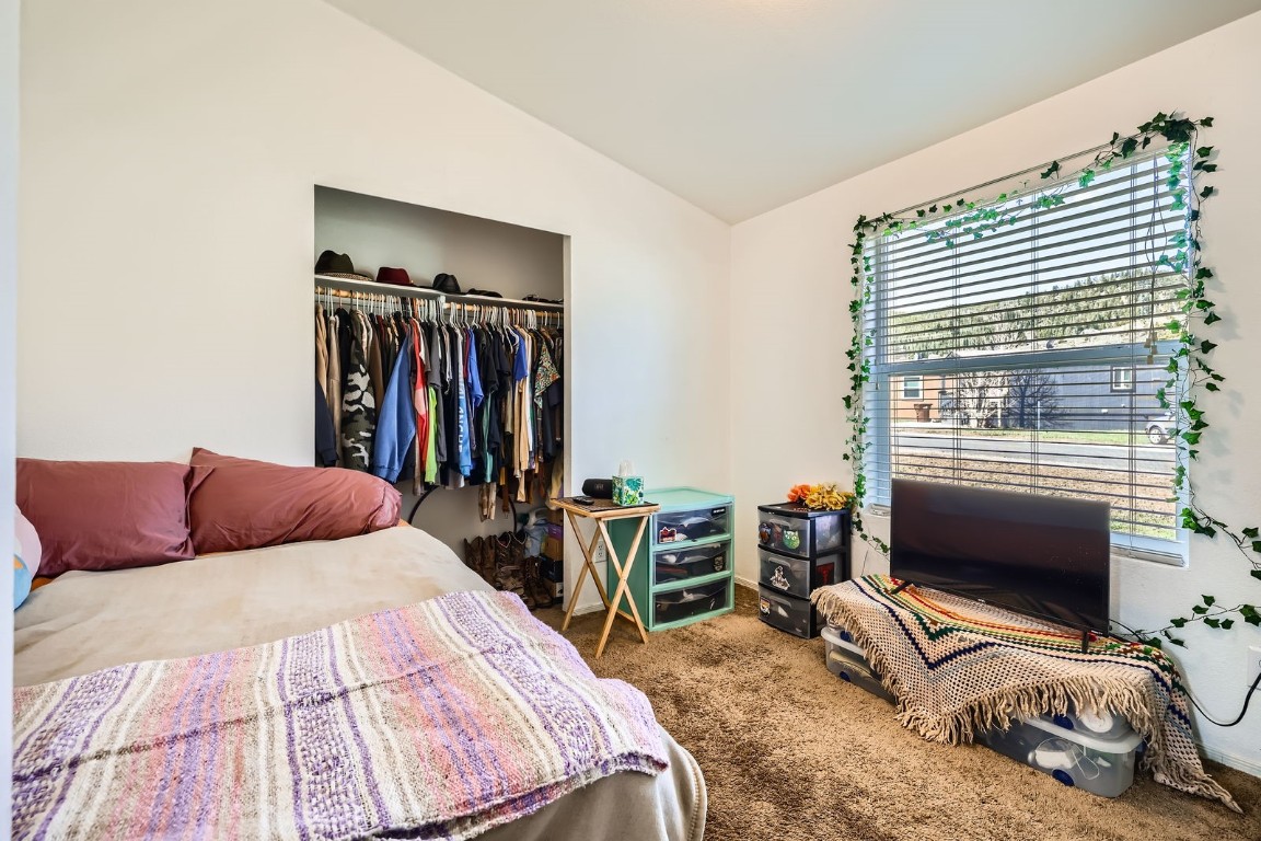 105 Red Cloud Peak Drive Dillon, CO 80435 - Photo 19 of 28 a bedroom with a bed and a flat tv screen