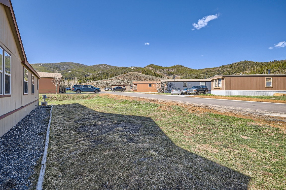 105 Red Cloud Peak Drive Dillon, CO 80435 - Photo 25 of 28 a view of an ocean with a building in the background