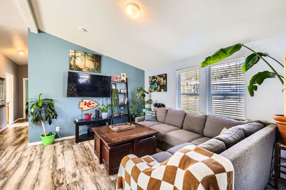 105 Red Cloud Peak Drive Dillon, CO 80435 - Photo 5 of 28 a living room with furniture a flat screen tv and a large window