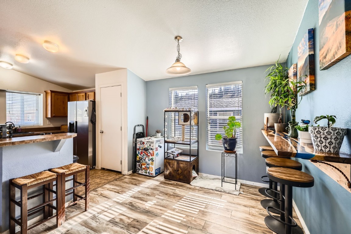 105 Red Cloud Peak Drive Dillon, CO 80435 - Photo 10 of 28 a view of a livingroom with workspace and a window