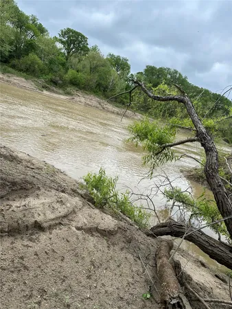 a view of a road with a yard