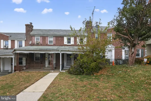 a view of a building with a garden