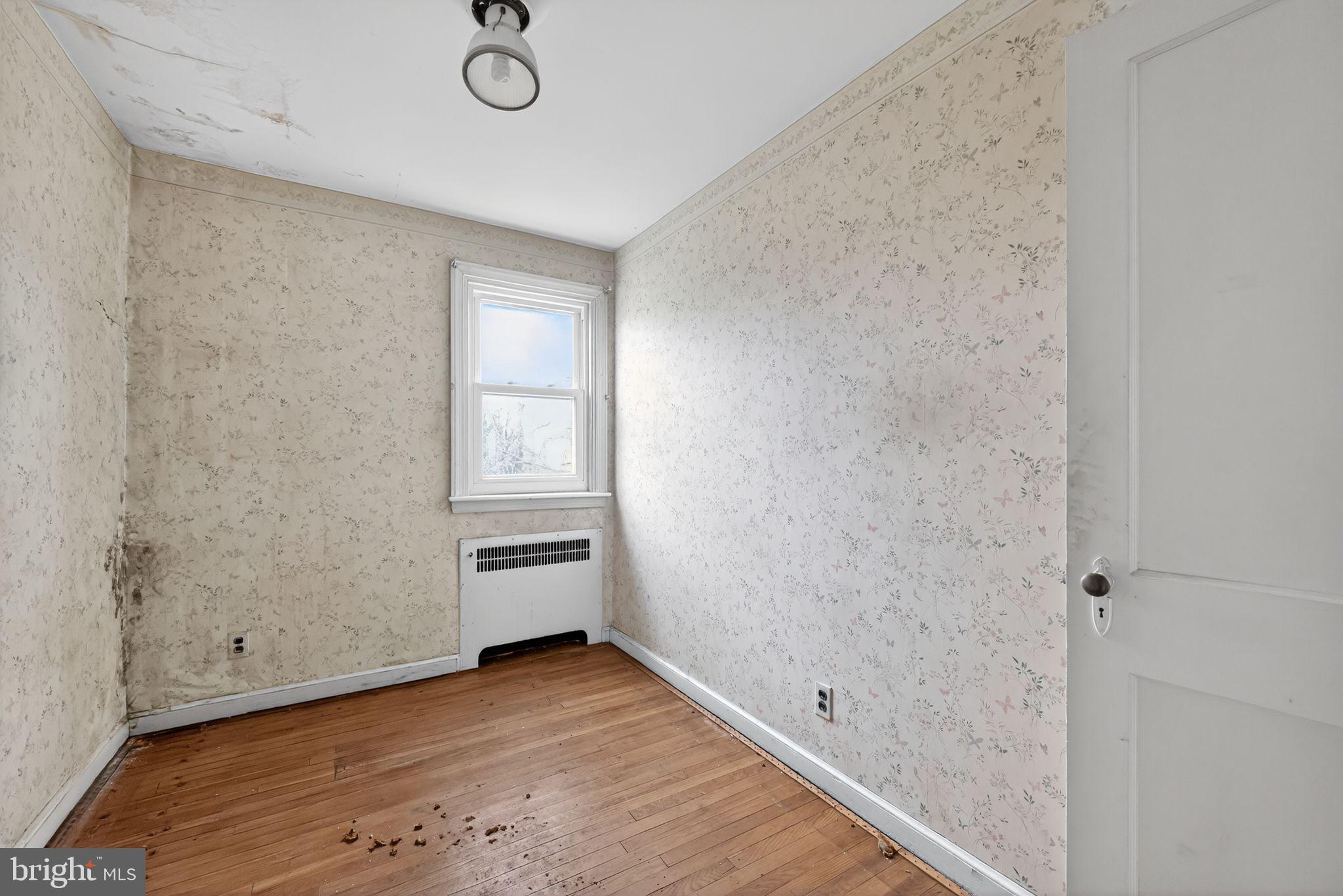 7181 Ruskin Lane Upper Darby, PA 19082 - Photo 16 of 30 a view of empty room with wooden floor and fan