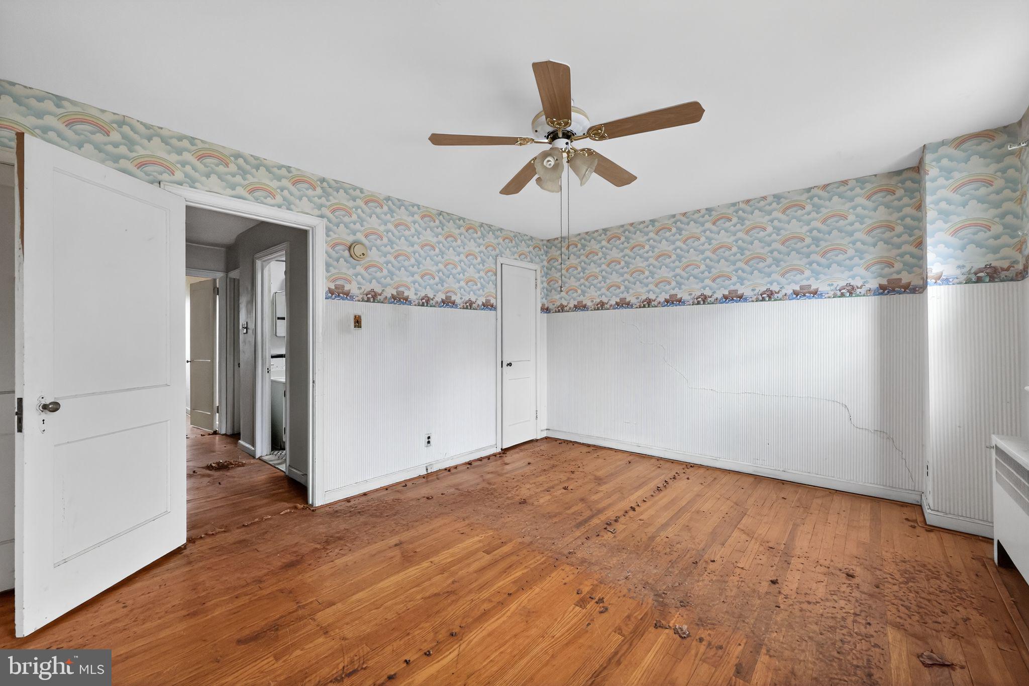 7181 Ruskin Lane Upper Darby, PA 19082 - Photo 22 of 30 a view of empty room with wooden floor