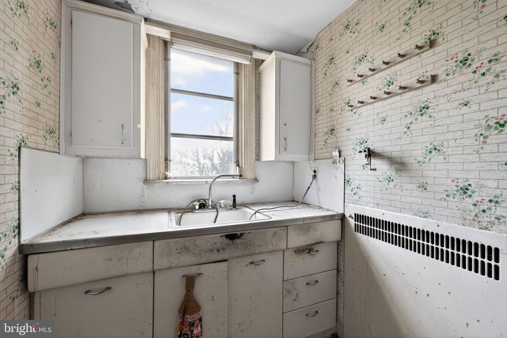 7181 Ruskin Lane Upper Darby, PA 19082 - Photo 10 of 30 a bathroom with a sink and a window