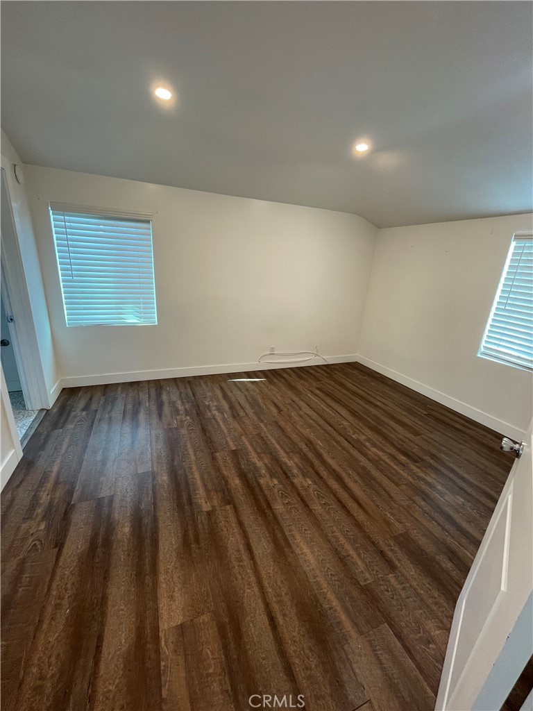8536 5th Street Downey, CA 90241 - Photo 4 of 13 wooden floor in a hall with an entryway