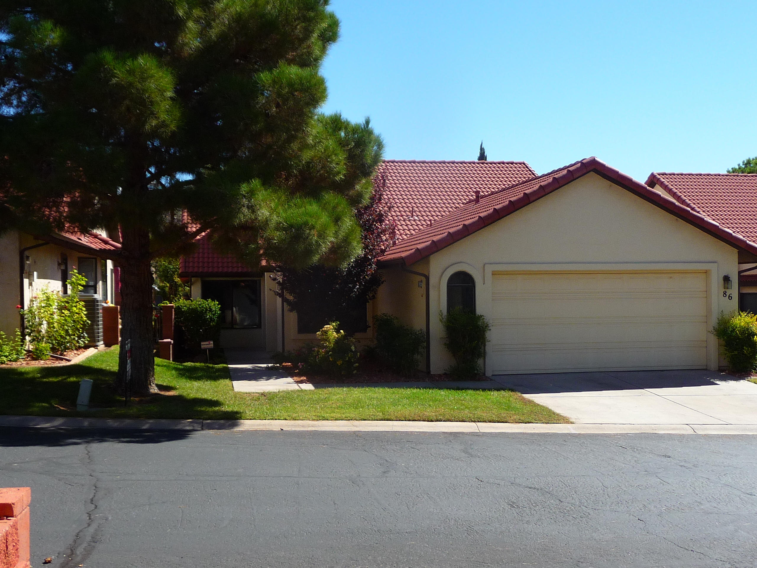 301 South 1200 East, Unit 86 St. George, UT 84790 - Photo 1 of 1 Front view with trees
