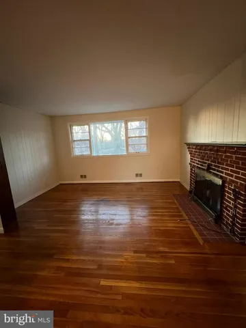 a kitchen with stainless steel appliances a stove refrigerator sink and cabinets