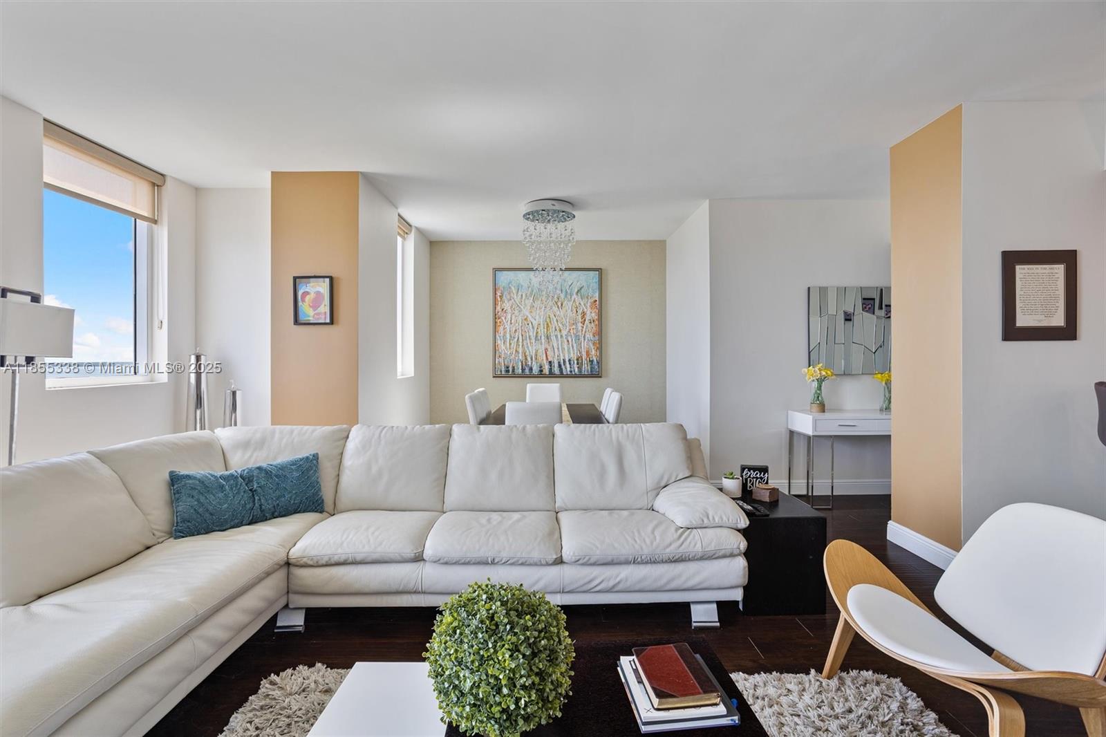 244 Biscayne Boulevard, Unit 1803 Miami, FL 33132 - Photo 12 of 38 a living room with furniture and a couch