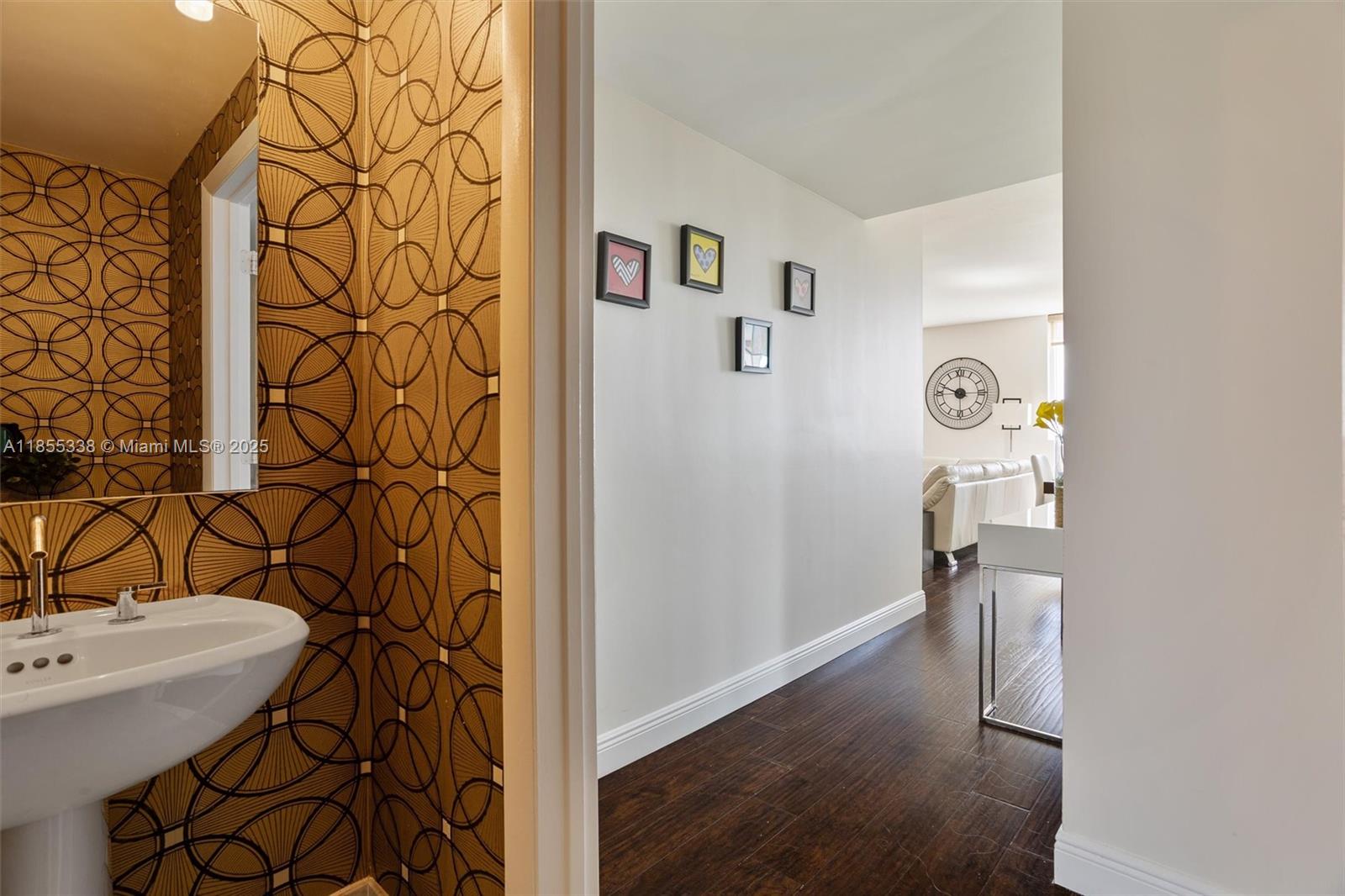 244 Biscayne Boulevard, Unit 1803 Miami, FL 33132 - Photo 18 of 38 a bathroom with a sink and mirror