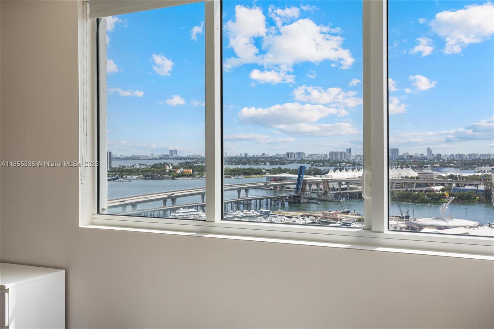 244 Biscayne Boulevard, Unit 1803 Miami, FL 33132 - Photo 23 of 38 a view of a city from a window