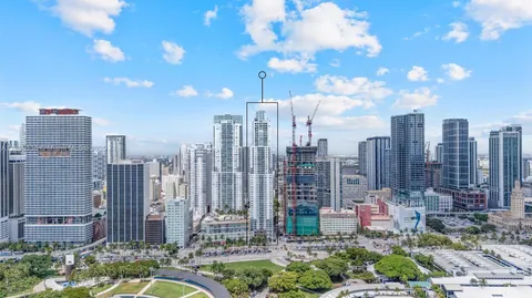 a view of a city with tall buildings