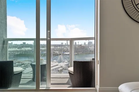 a view of a glass door and chair