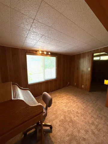 a stove top oven sitting inside of a kitchen