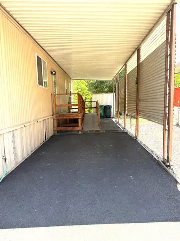 a kitchen with cabinets stainless steel appliances and a sink