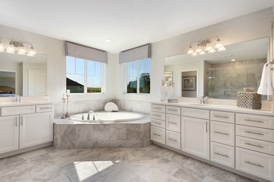337 West Pt Circle Algonquin, IL 60102 - Photo 17 of 26 a spacious bathroom with a double vanity sink mirror and bathtub
