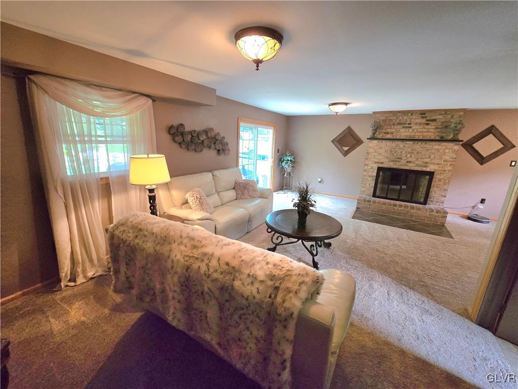 2231 Mountain Road Slatington, PA 18080 - Photo 12 of 41 a living room with furniture and a lamp