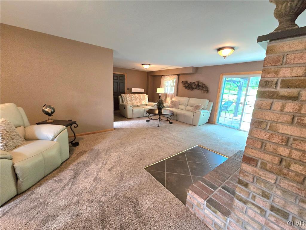 2231 Mountain Road Slatington, PA 18080 - Photo 14 of 41 a living room with furniture and a rug