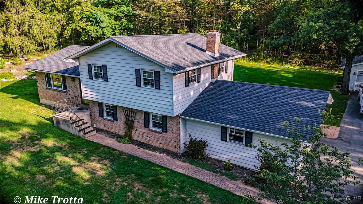 2231 Mountain Road Slatington, PA 18080 - Photo 38 of 41 a aerial view of a house with a yard table and chairs