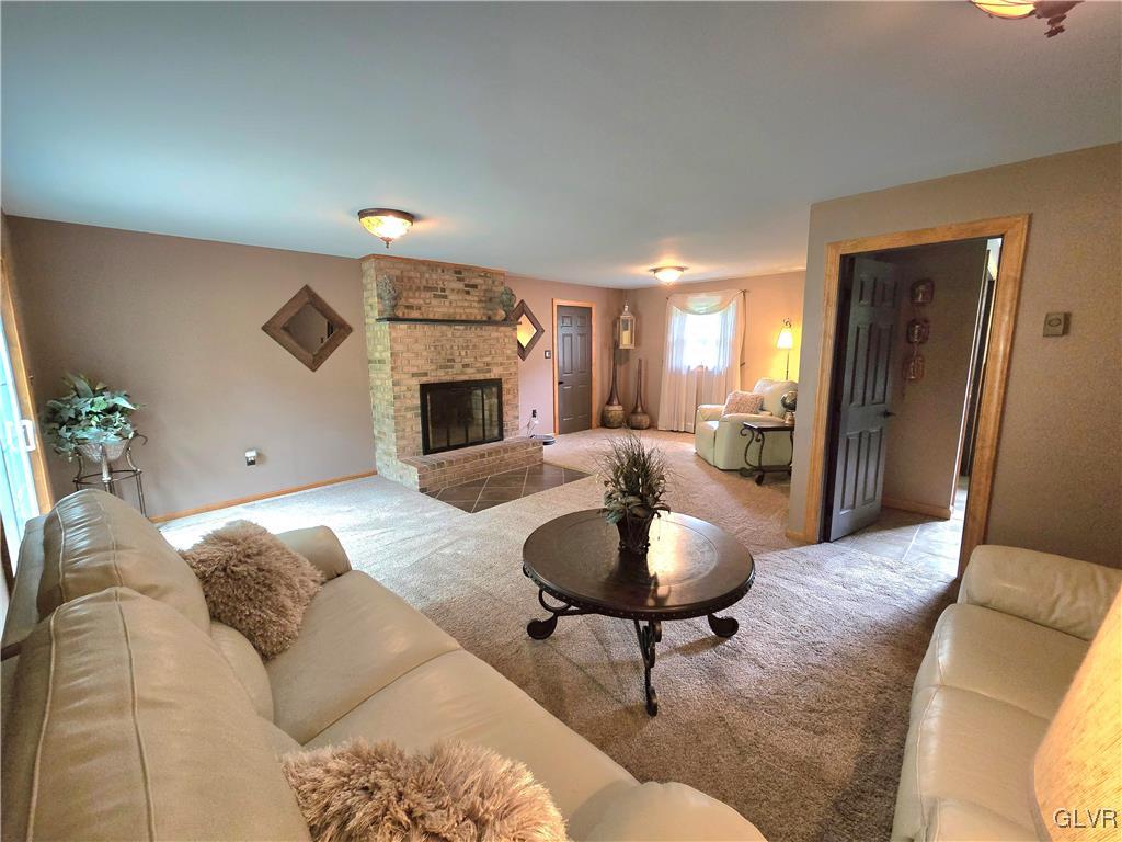 2231 Mountain Road Slatington, PA 18080 - Photo 10 of 41 a living room with furniture and a fireplace