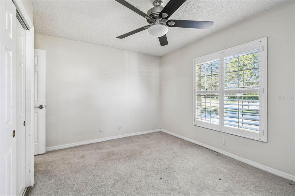 4161 Rolling Springs Drive Tampa, FL 33624 - Photo 22 of 52 a view of an empty room with a window