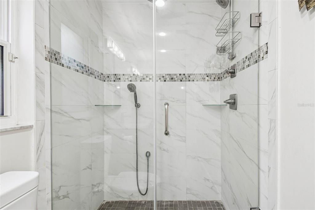 4161 Rolling Springs Drive Tampa, FL 33624 - Photo 27 of 52 a bathroom with a shower