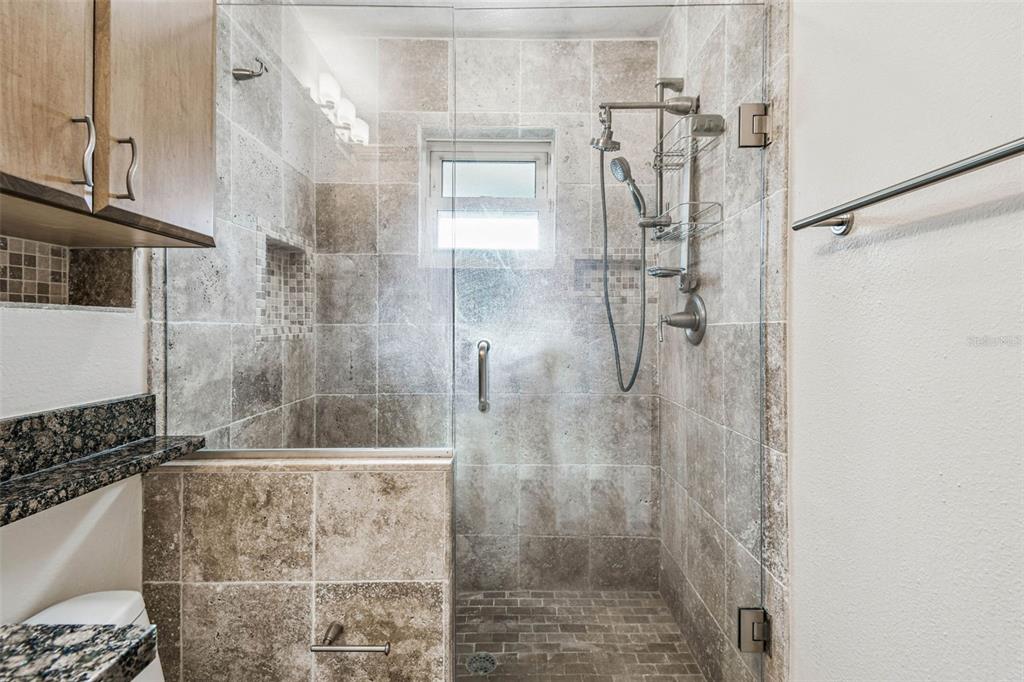 4161 Rolling Springs Drive Tampa, FL 33624 - Photo 35 of 52 a bathroom with a shower