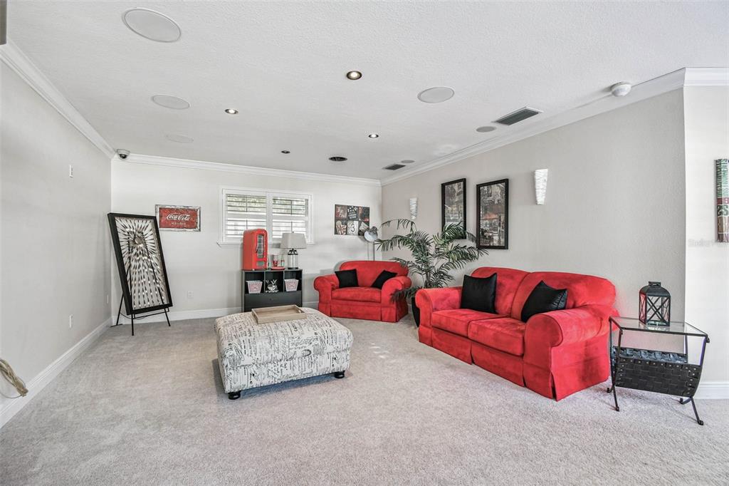 4161 Rolling Springs Drive Tampa, FL 33624 - Photo 40 of 52 a living room with furniture and white walls