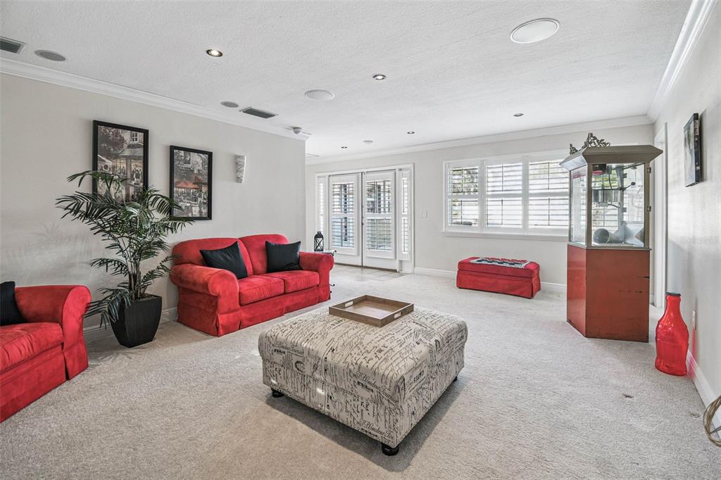 4161 Rolling Springs Drive Tampa, FL 33624 - Photo 41 of 52 a living room with furniture and a large window