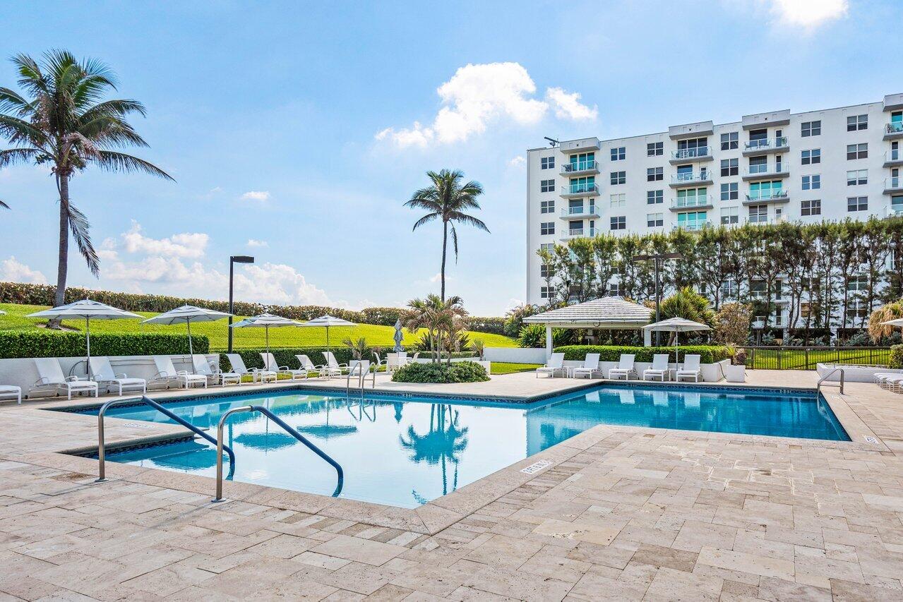3440 South Ocean Boulevard, Unit 508N Palm Beach, FL 33480 - Photo 29 of 34 a view of swimming pool with outdoor seating