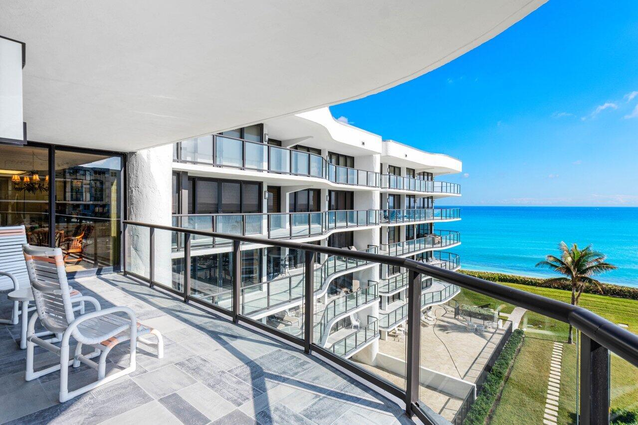 3440 South Ocean Boulevard, Unit 508N Palm Beach, FL 33480 - Photo 9 of 34 a view of a living room and balcony