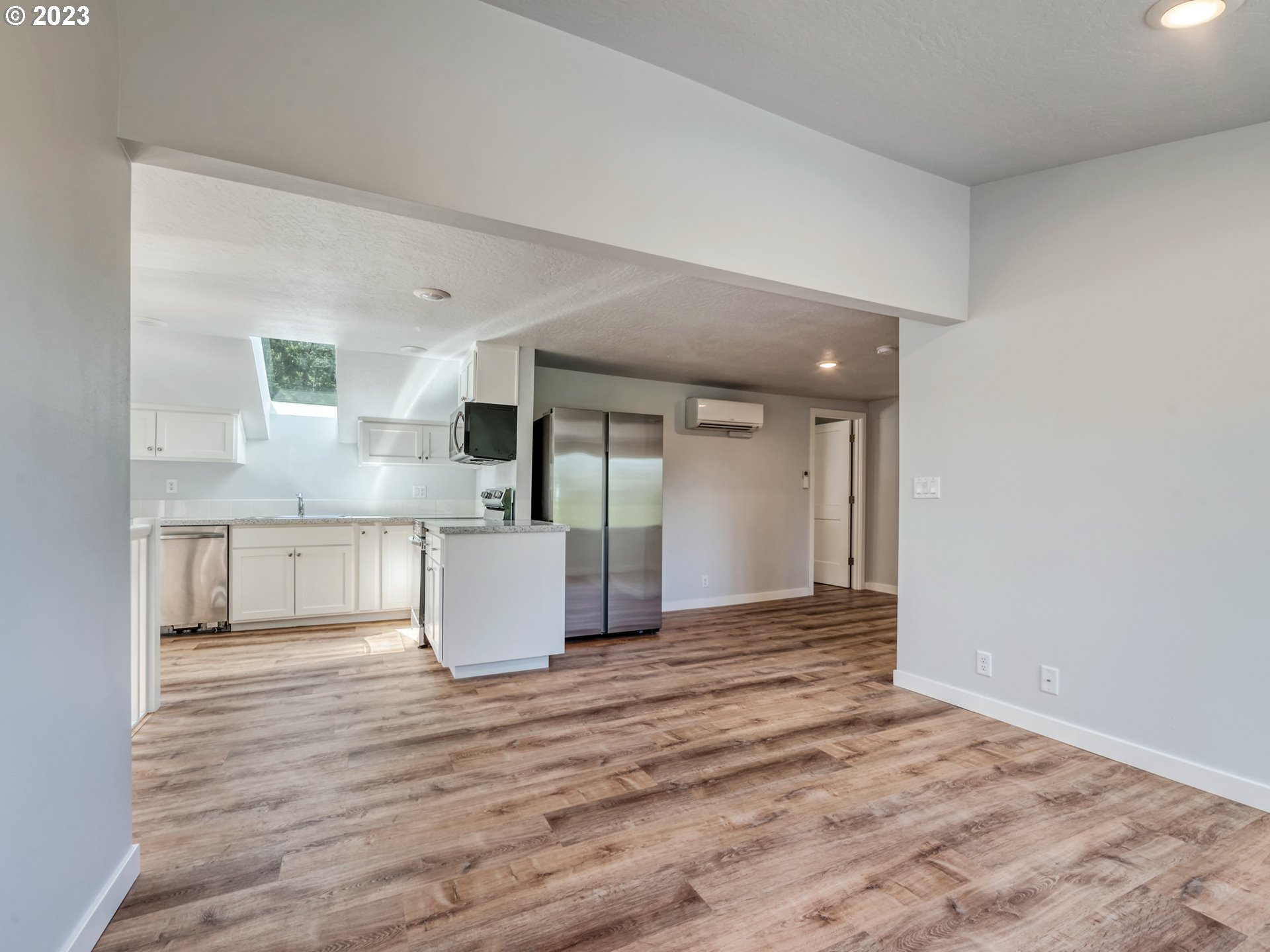 2285 City View Street Eugene, OR 97405 - Photo 27 of 47 a view of kitchen and kitchen with granite countertop stove top oven