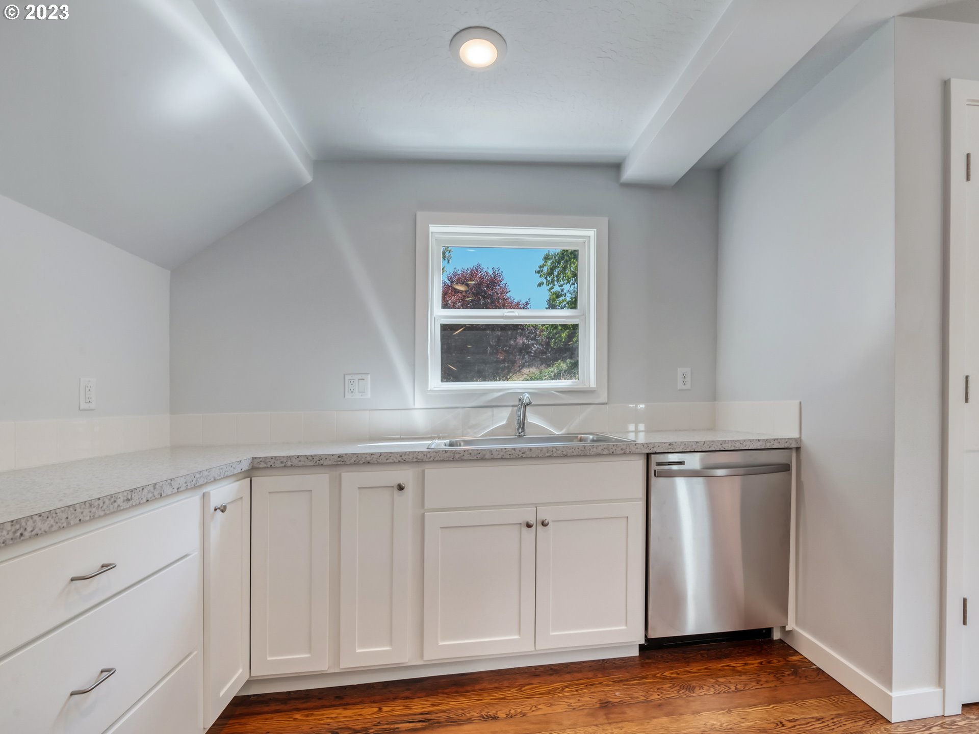 2285 City View Street Eugene, OR 97405 - Photo 30 of 47 a view of cabinets with wooden floor and cabinet