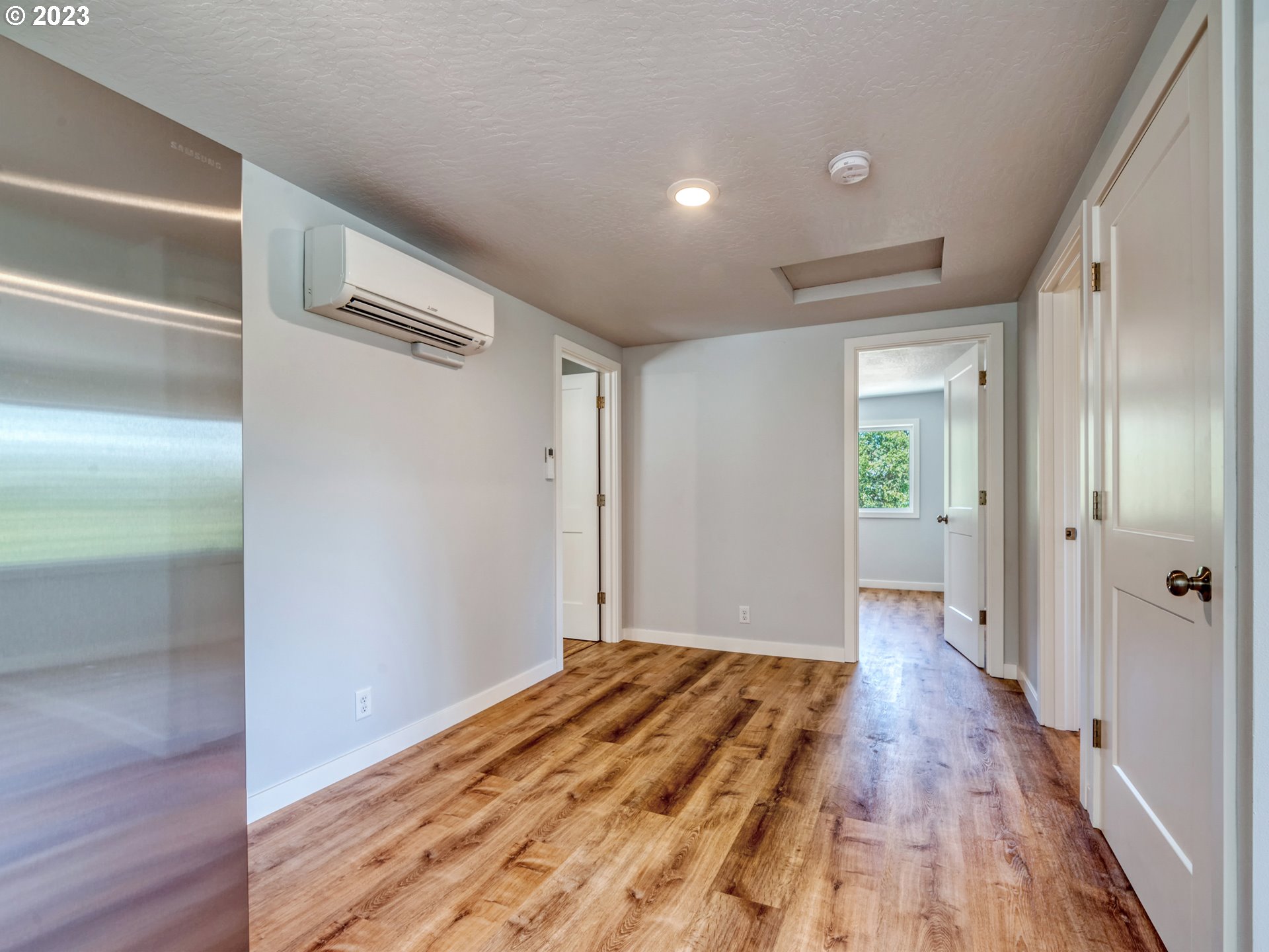 2285 City View Street Eugene, OR 97405 - Photo 33 of 47 a view of hallway with wooden floor