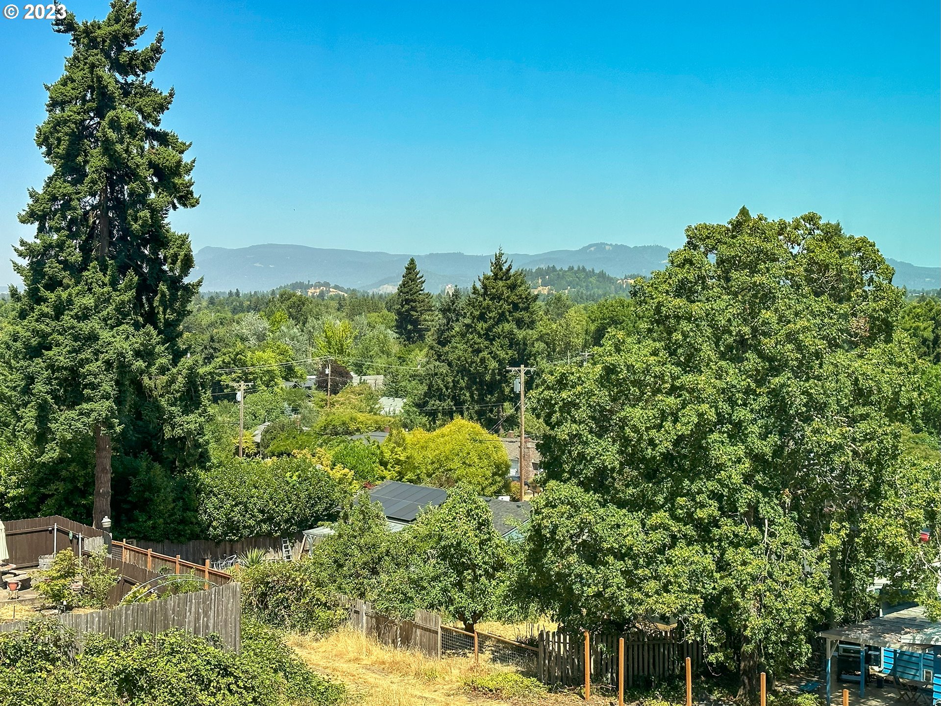 2285 City View Street Eugene, OR 97405 - Photo 47 of 47 a view of a lake with a building in the background