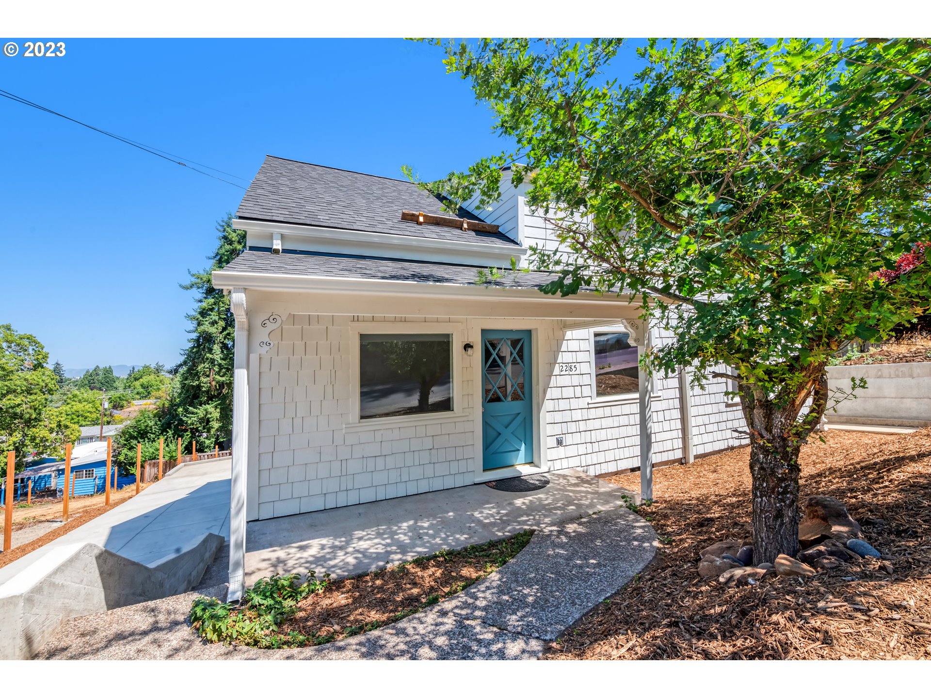 2285 City View Street Eugene, OR 97405 - Photo 5 of 47 a view of a house with a yard