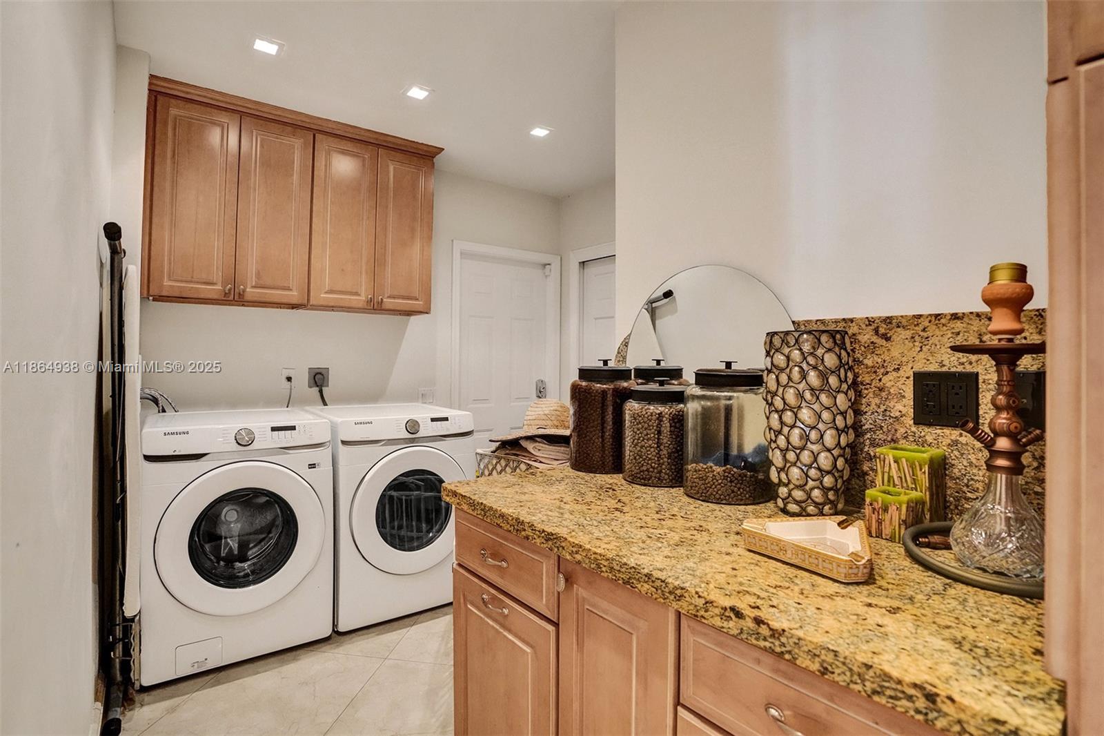 12840 Hickory Road North Miami, FL 33181 - Photo 13 of 21 a utility room with dryer and washer