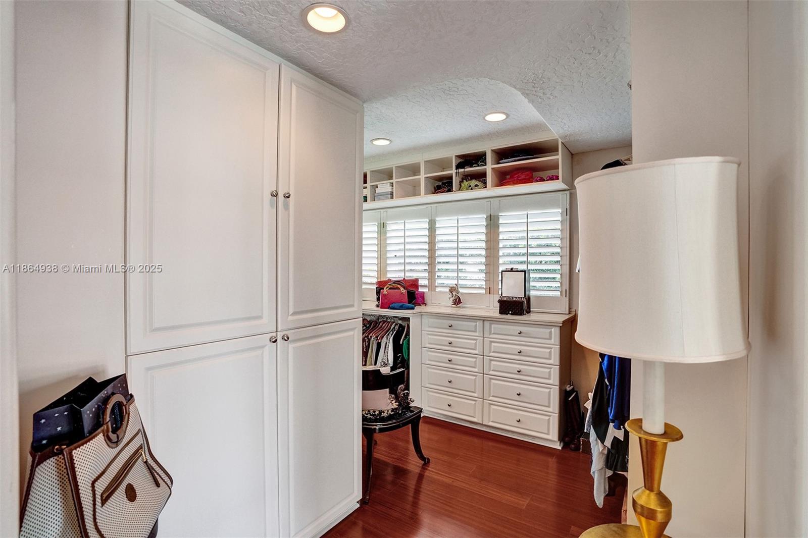 12840 Hickory Road North Miami, FL 33181 - Photo 17 of 21 a workspace with furniture and a window