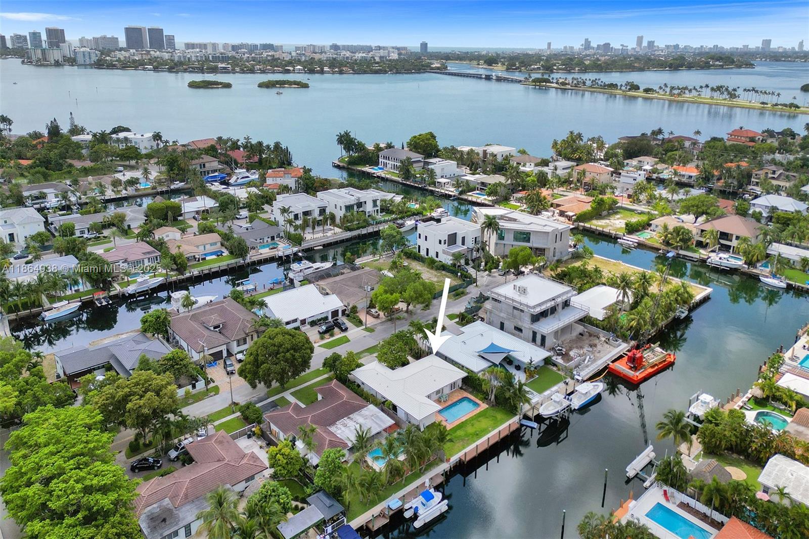 12840 Hickory Road North Miami, FL 33181 - Photo 5 of 21 a view of a lake with a city
