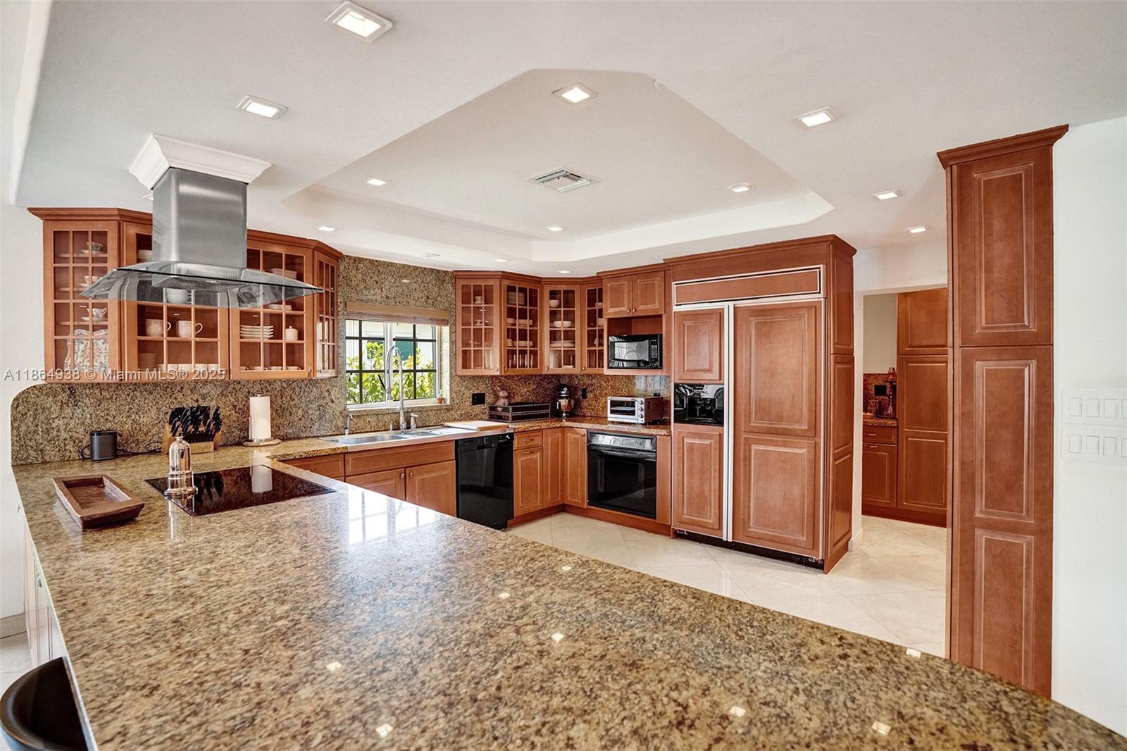 12840 Hickory Road North Miami, FL 33181 - Photo 9 of 21 a kitchen with stainless steel appliances granite countertop a refrigerator and a sink
