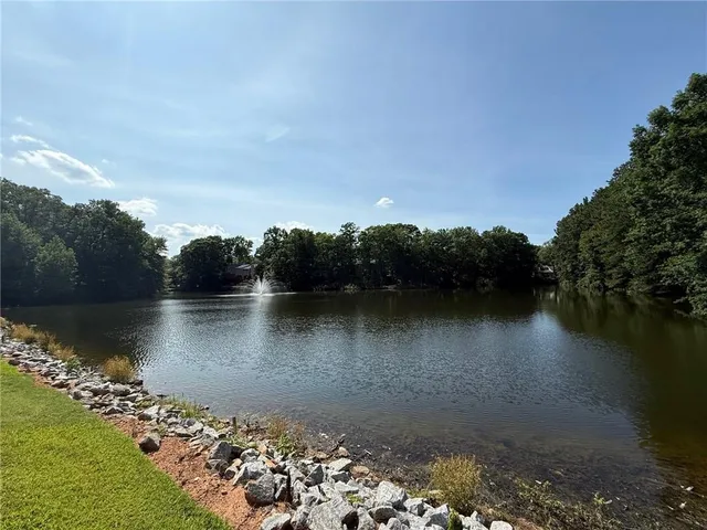 a big yard with lots of green space and deers