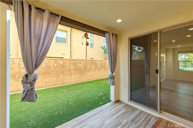 a view of an entryway of the house and garden