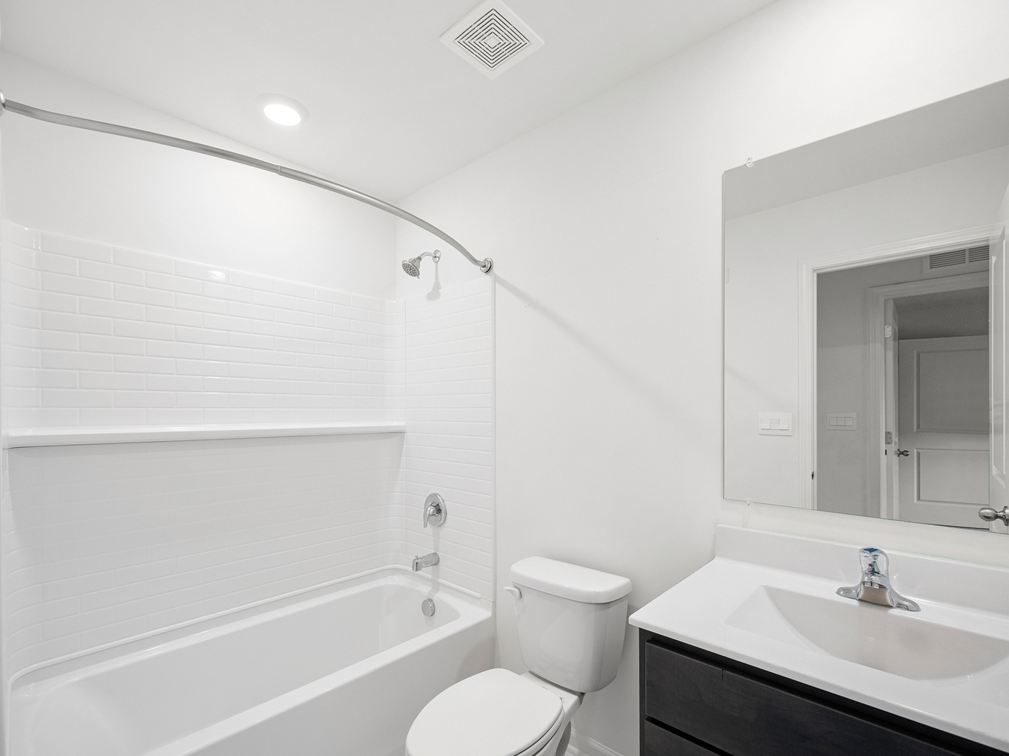 1533 Yosemite Way Pingree Grove, IL 60140 - Photo 13 of 17 a bathroom with a sink toilet a vanity and shower