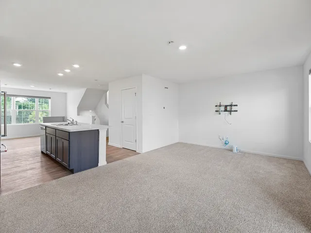 a view of a kitchen with a sink and a dishwasher